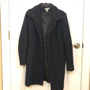 Long navy coat.